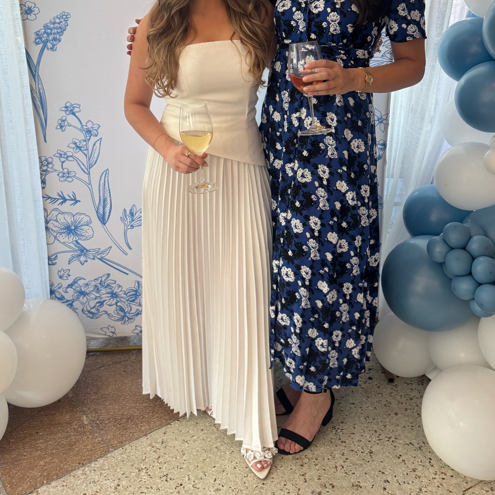 White pleated asymmetrical dress